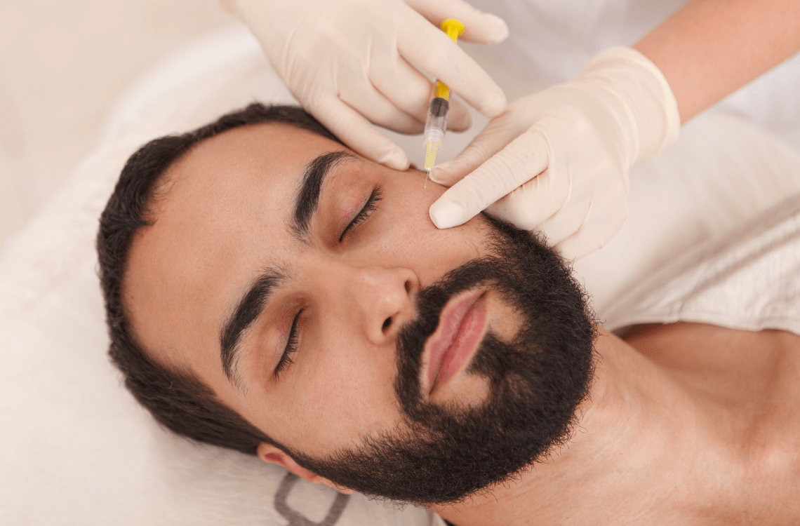man having Muscle Relaxing Injections in his face